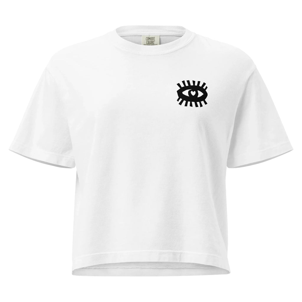 T-shirt boxy femme blanc à motif œil graphique noir sur la poitrine, style moderne